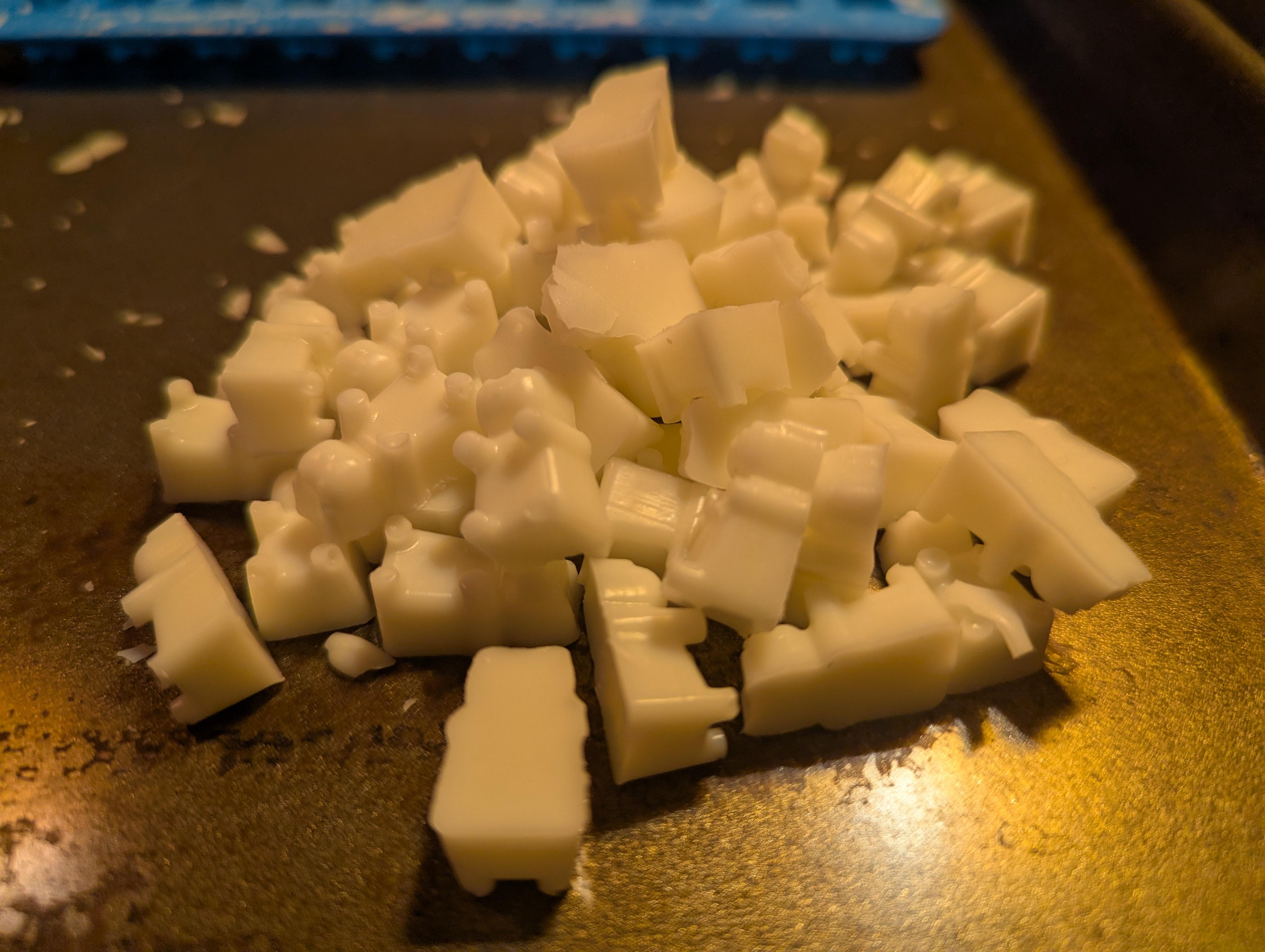 A pile of white, waxy progbears